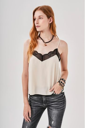 

Top Rapsodia Rocker Encaje Crudo Talla: M y color: crudo