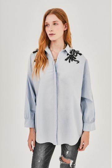

Camisa Rapsodia Louise P Celeste Talla: XL y color: celeste