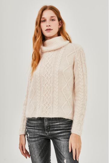 

Suéter Rapsodia Nollan New Crudo Talla: M y color: crudo