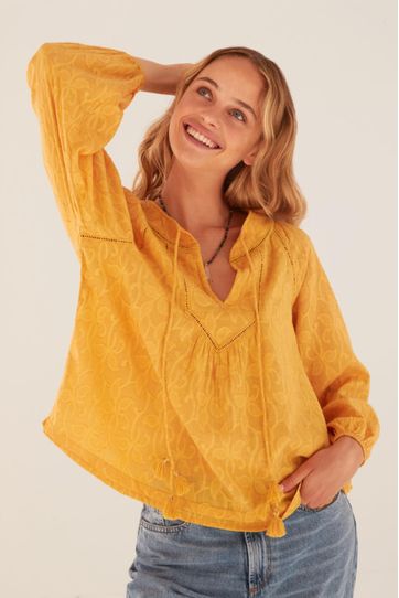 

Camisa Arusha Rapsodia New Talla: XL y color: mostaza
