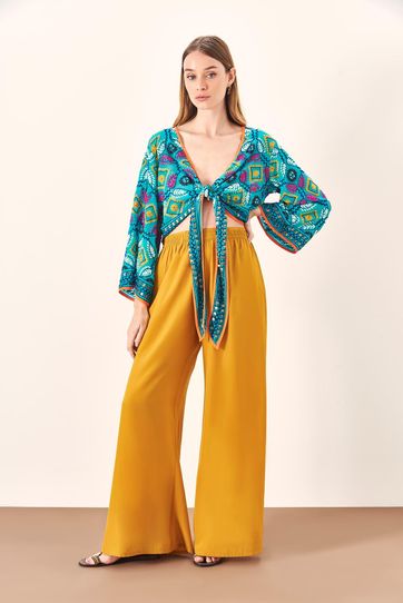 

Pantalón Rapsodia Meli Plain D Mostaza Talla: L y color: mostaza