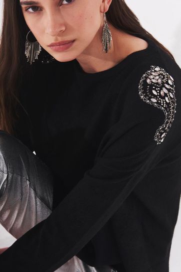 

Sweater Rapsodia Tokiwa Talla: M y color: negro