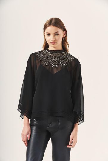 

Camisa Rapsodia Romance New Talla: L y color: negro