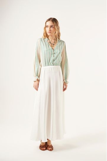 

Falda Rapsodia Fly New Talla: L y color: crudo