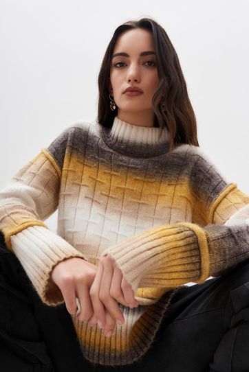 

Sweater Rapsodia Adalet Talla: S y color: mostaza